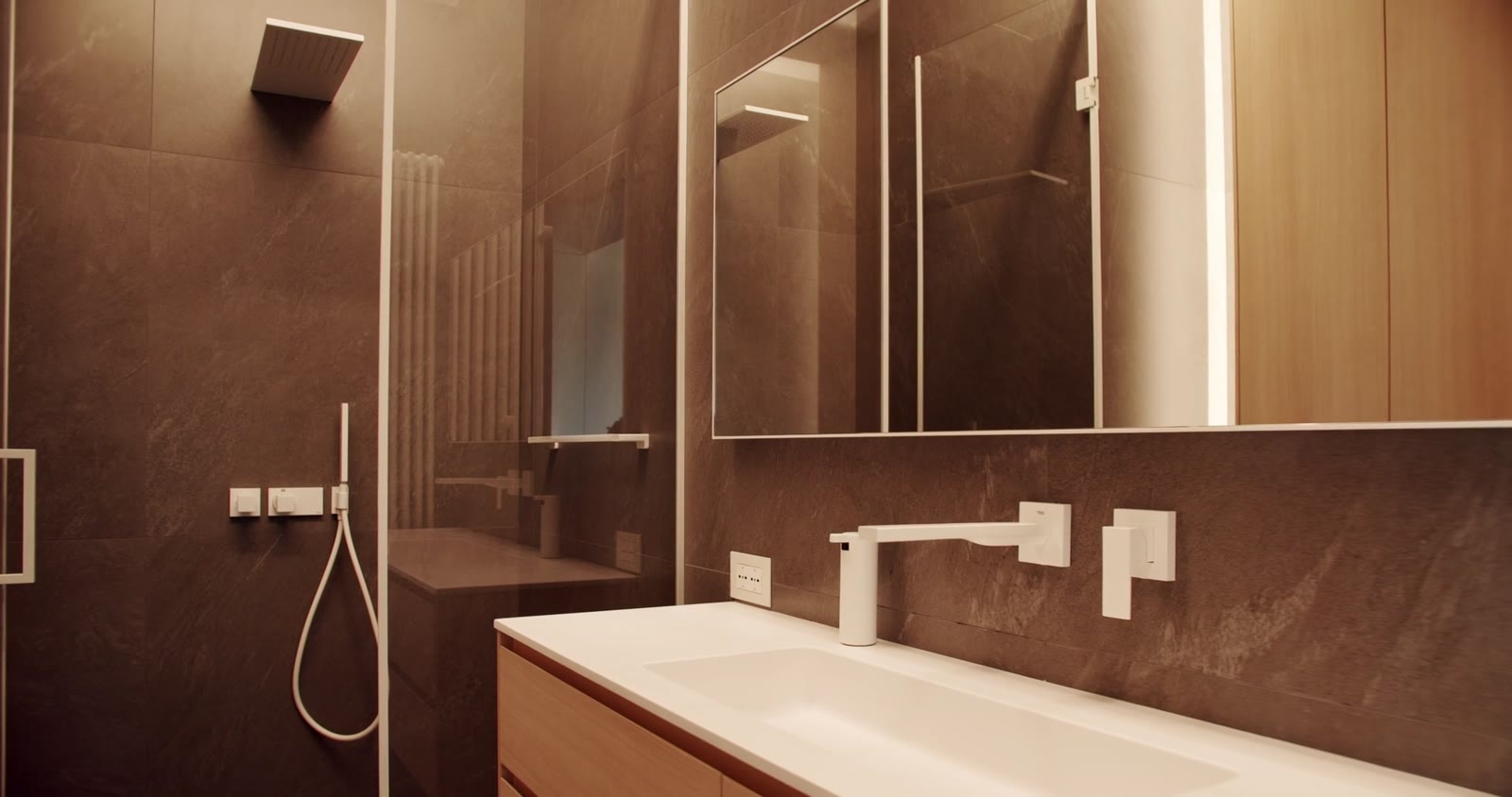 Modern bathroom with tiled shower and vanity by Art Floor
