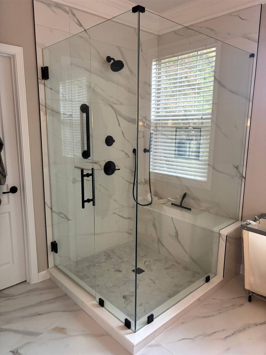 Glass-enclosed porcelain tile walk-in shower