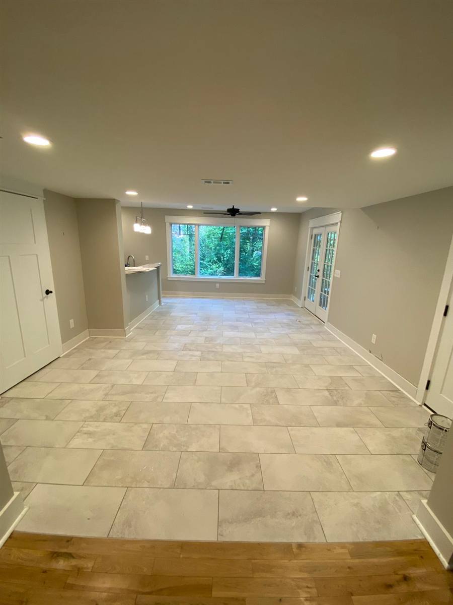 Large-format tile flooring in an open room